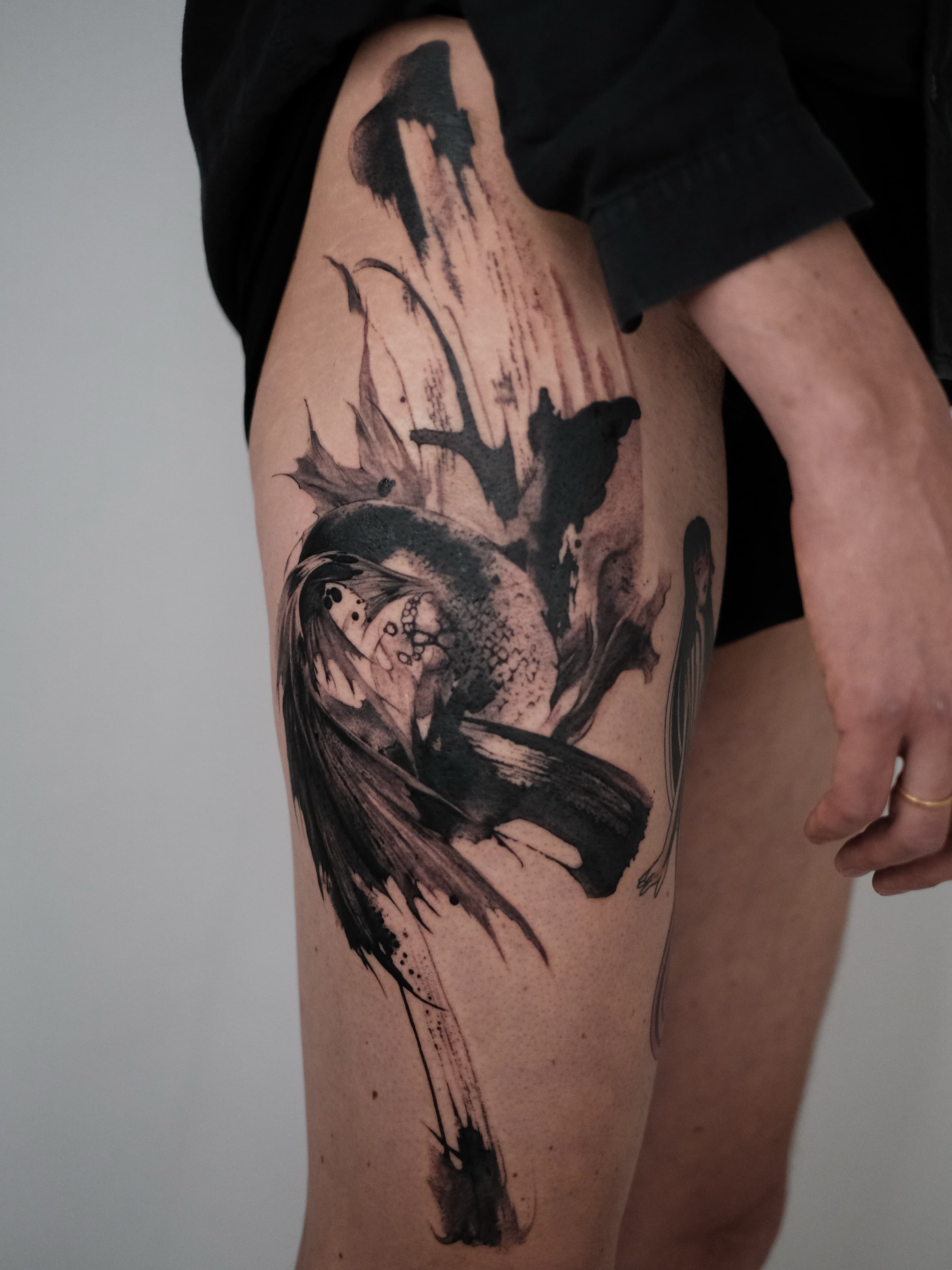 The Little Mermaid hidden beneath the skin.